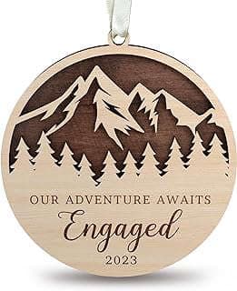 Image of Engagement Christmas Ornament by the company Top Ten Trending.